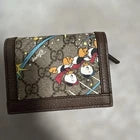 Gucci x Disney Donald Duck Bi-Fold Wallet – GG Supreme Canvas